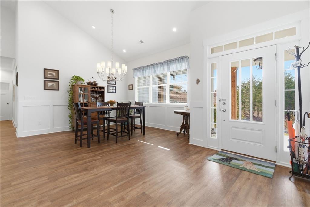 760 Stoneledge Road Jasper, GA 30143 - Photo 13 of 68 a view of a dining room with furniture and chandelier