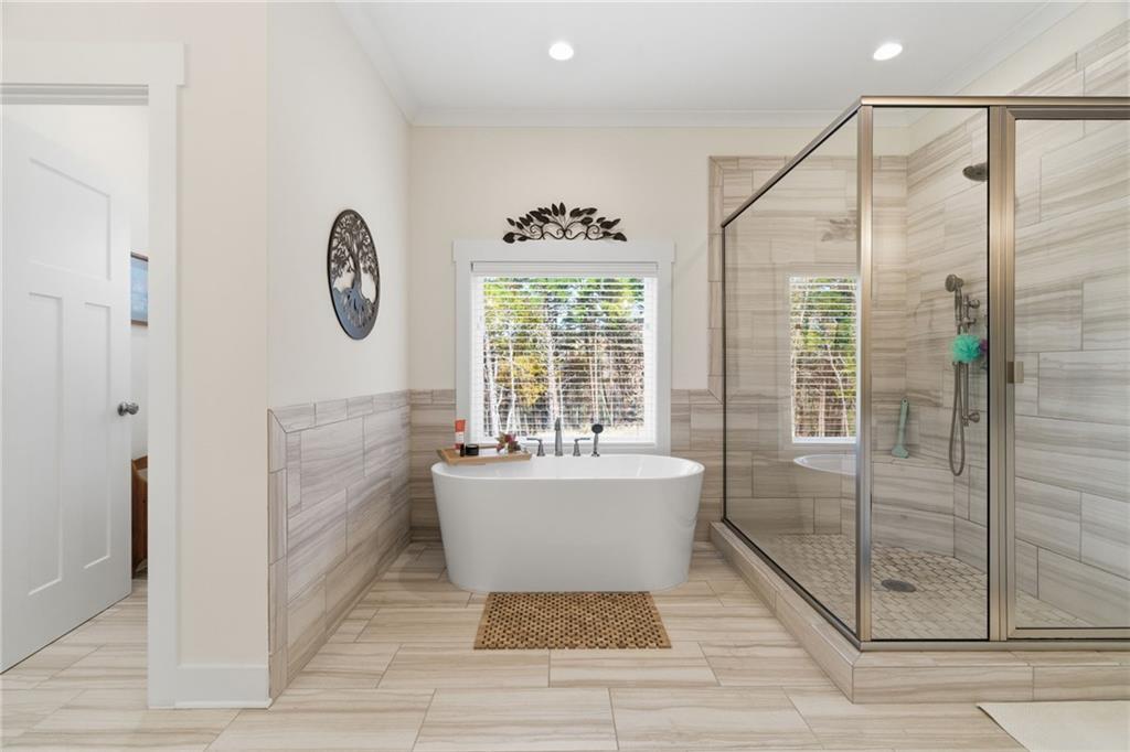 760 Stoneledge Road Jasper, GA 30143 - Photo 17 of 68 a living room with a window and a table