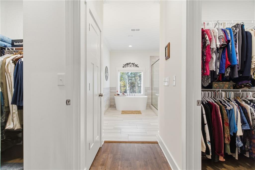 760 Stoneledge Road Jasper, GA 30143 - Photo 20 of 68 a view of walk in closet with clothes and shoes