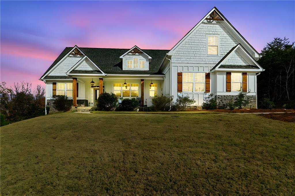 760 Stoneledge Road Jasper, GA 30143 - Photo 2 of 68 a front view of a house with garden