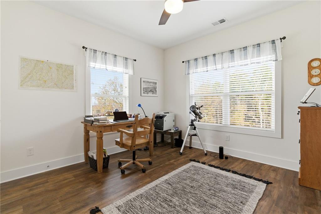 760 Stoneledge Road Jasper, GA 30143 - Photo 23 of 68 a workspace with furniture and a window
