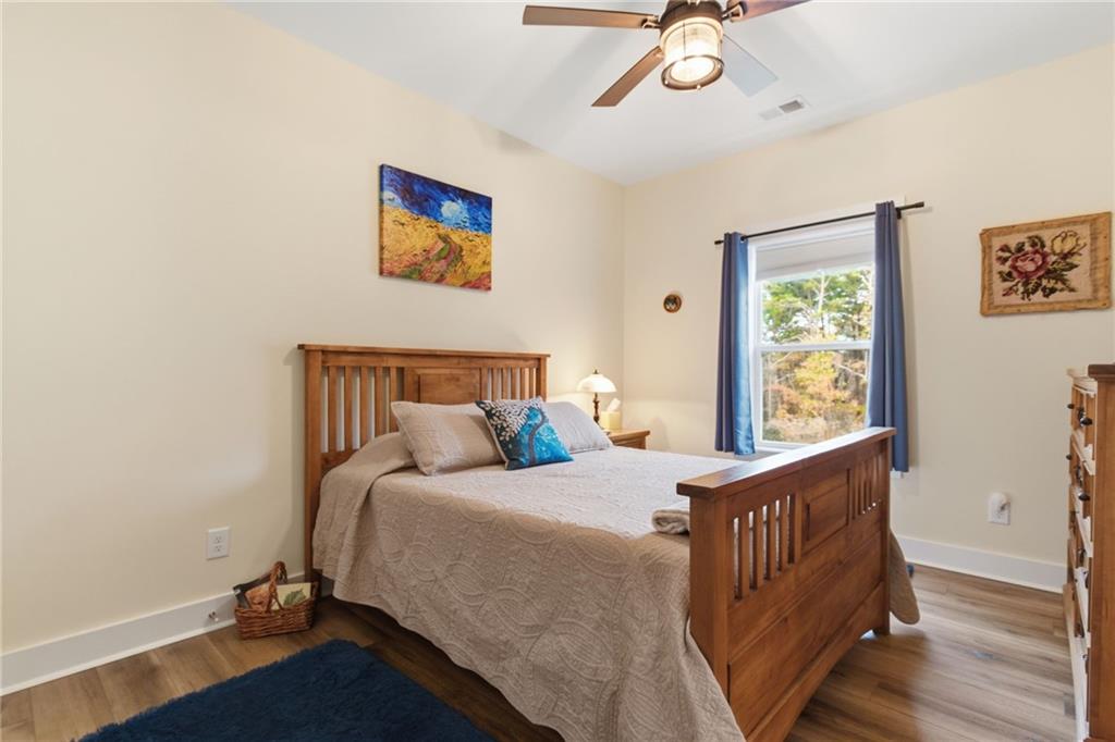 760 Stoneledge Road Jasper, GA 30143 - Photo 36 of 68 a bedroom with a bed and a window