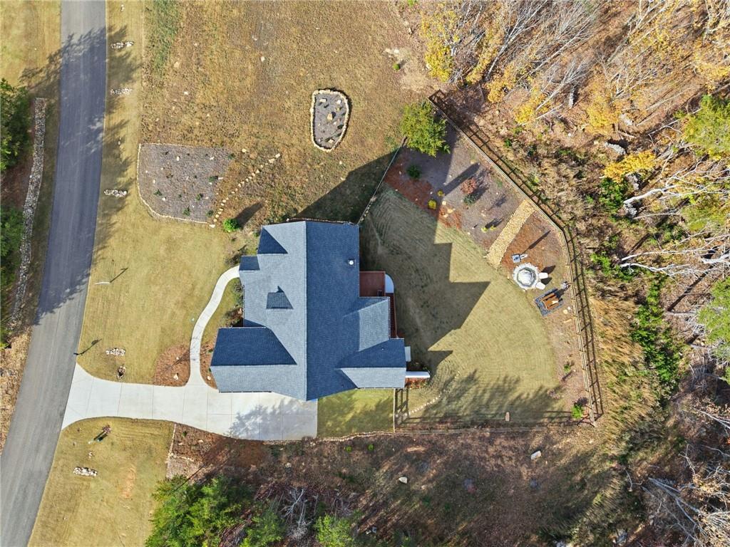 760 Stoneledge Road Jasper, GA 30143 - Photo 55 of 68 an aerial view of a house with a yard