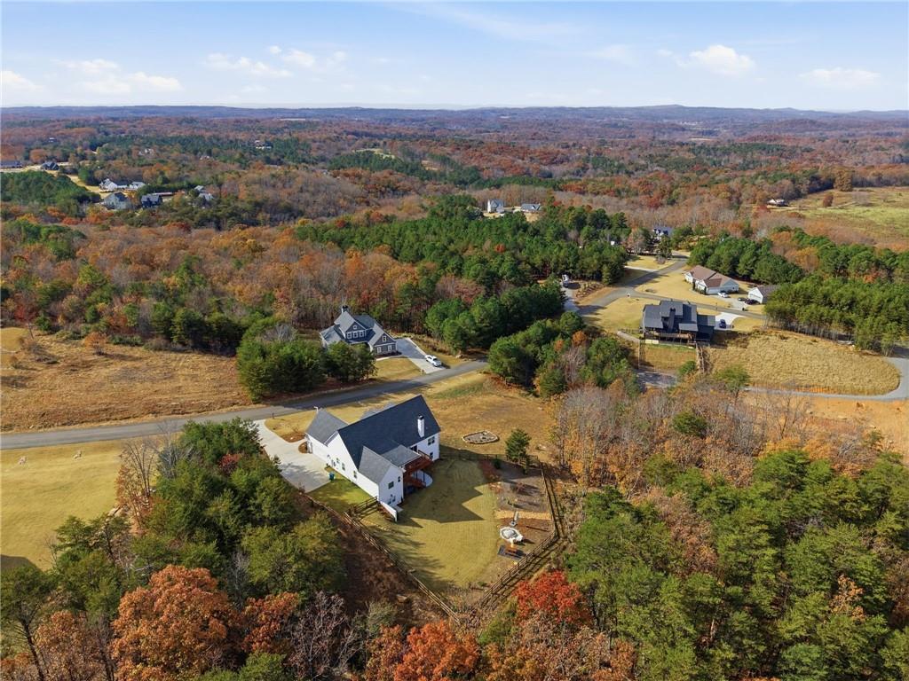760 Stoneledge Road Jasper, GA 30143 - Photo 57 of 68 an aerial view of a house with a lake view