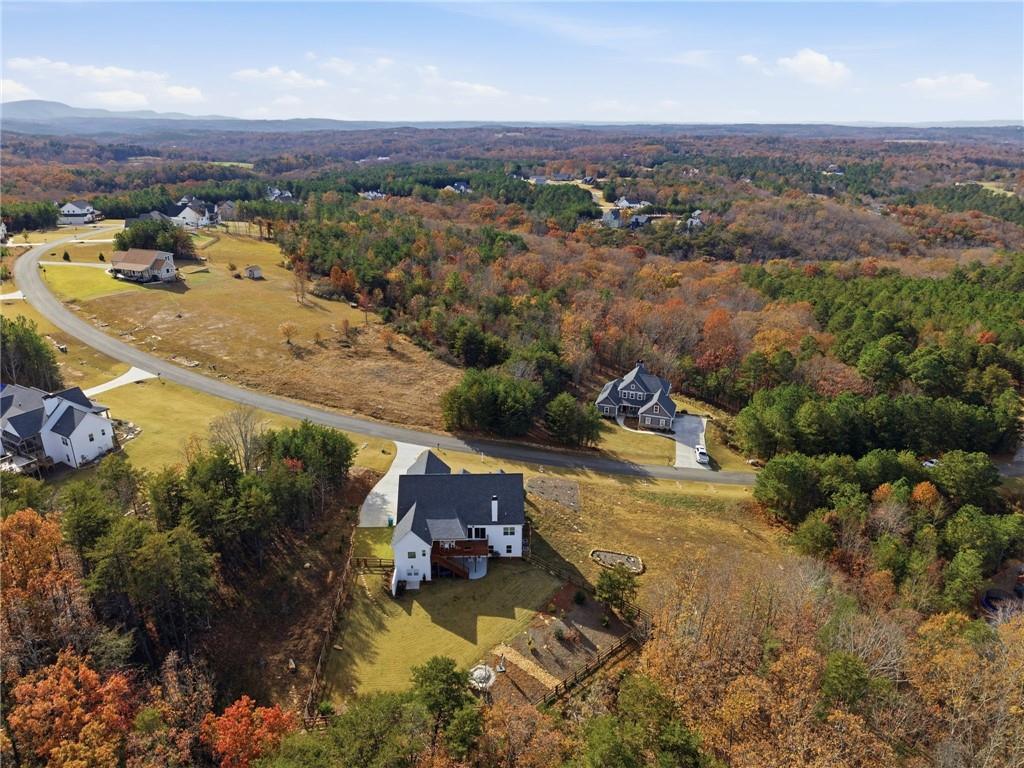760 Stoneledge Road Jasper, GA 30143 - Photo 58 of 68 an aerial view of a house with a yard