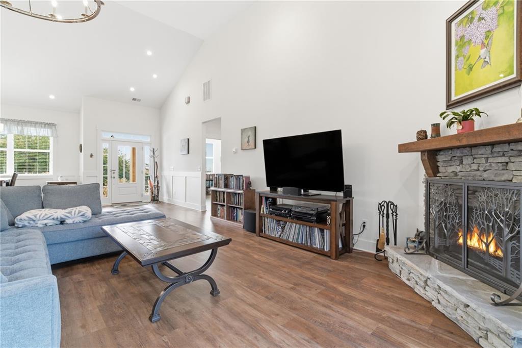 760 Stoneledge Road Jasper, GA 30143 - Photo 10 of 68 a living room with furniture and a flat screen tv