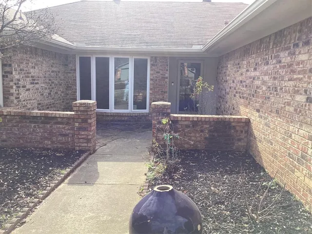 a view of entrance gate of the house