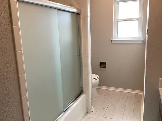 a bathroom with a toilet