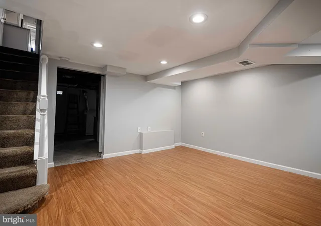 a view of a room with an empty space