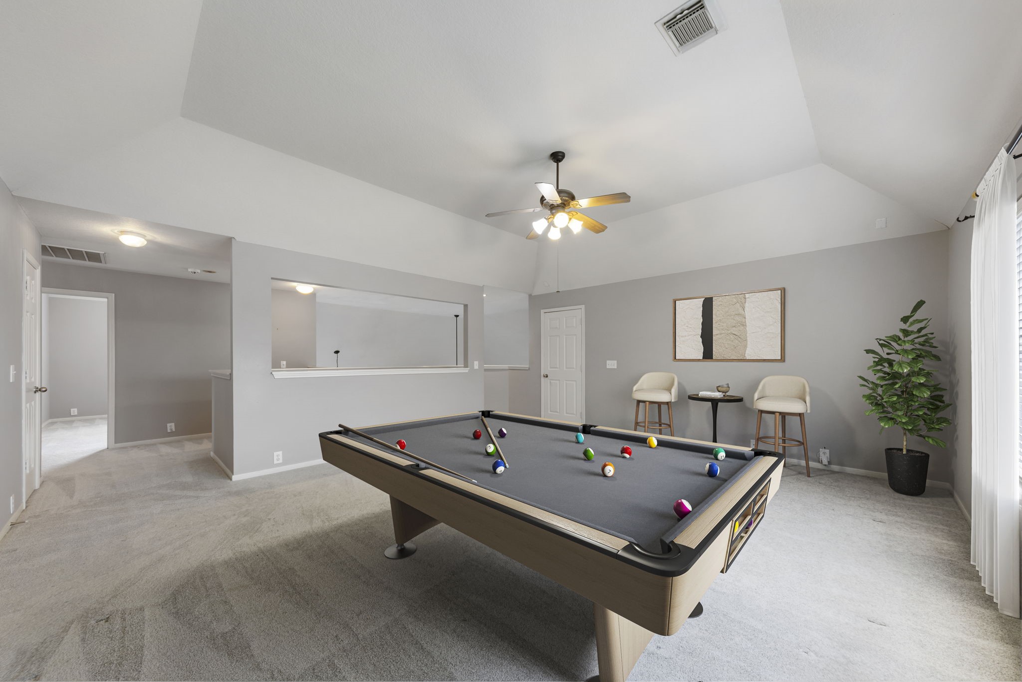 2907 Stemwood Drive Spring, TX 77388 - Photo 19 of 33 Expansive upstairs game room w/ vaulted ceilings, abundant natural light, & flexible space for a media room, game area, home office, or additional living space. Open layout overlooks the main living area below while offering plenty of room for entertaining, relaxing, or everyday functionality. *virtually staged*