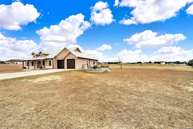 a house view with a lake view
