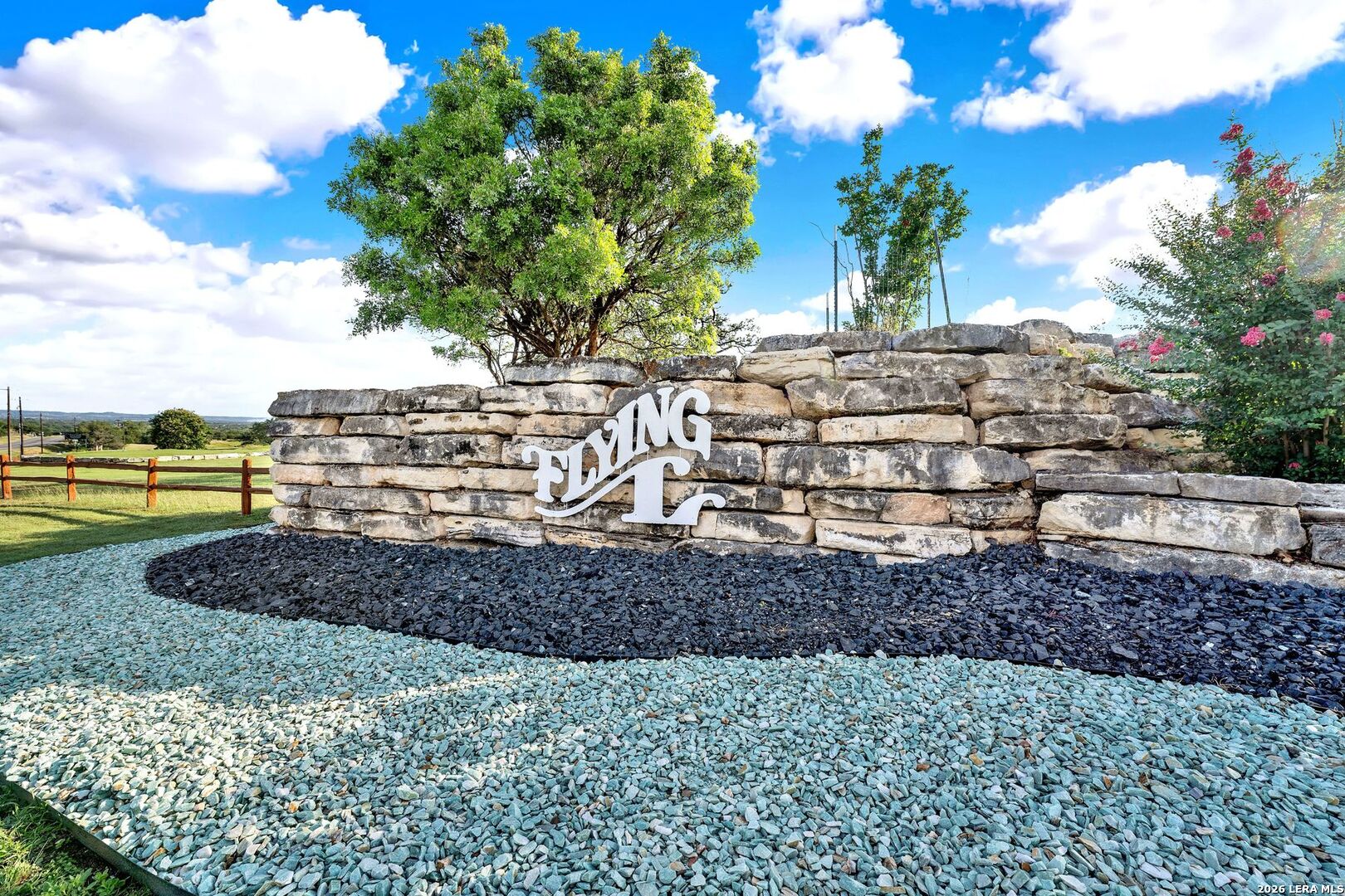 445 Spanish Grant Circle Bandera, TX 78003 - Photo 2 of 47 a front view of a house with a yard