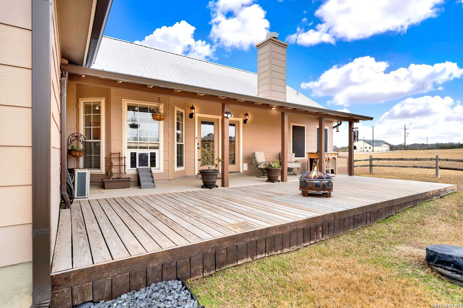 445 Spanish Grant Circle Bandera, TX 78003 - Photo 44 of 47 a view of a house with swimming pool and sitting area
