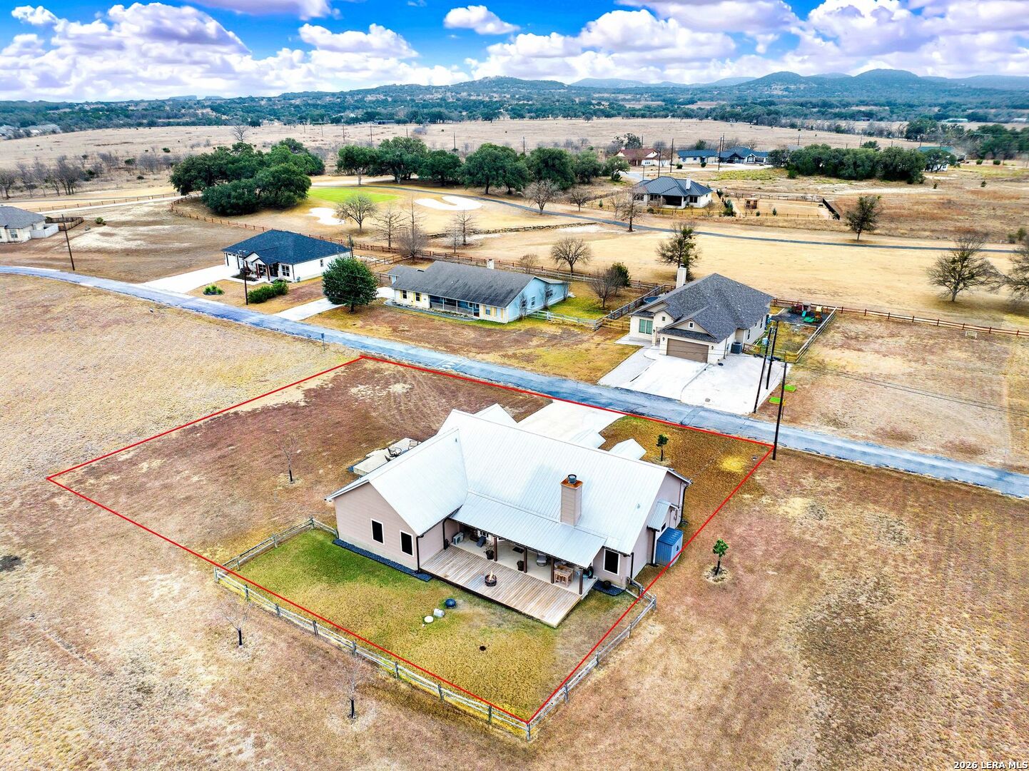 445 Spanish Grant Circle Bandera, TX 78003 - Photo 5 of 47 an aerial view of a house with a ocean view
