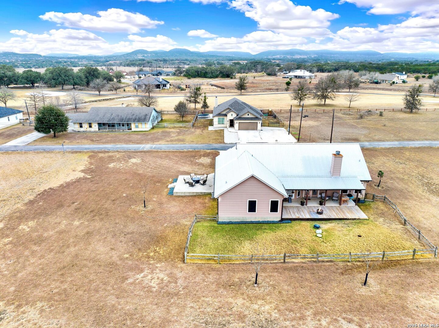 445 Spanish Grant Circle Bandera, TX 78003 - Photo 7 of 47 a view of a swimming pool with an ocean view