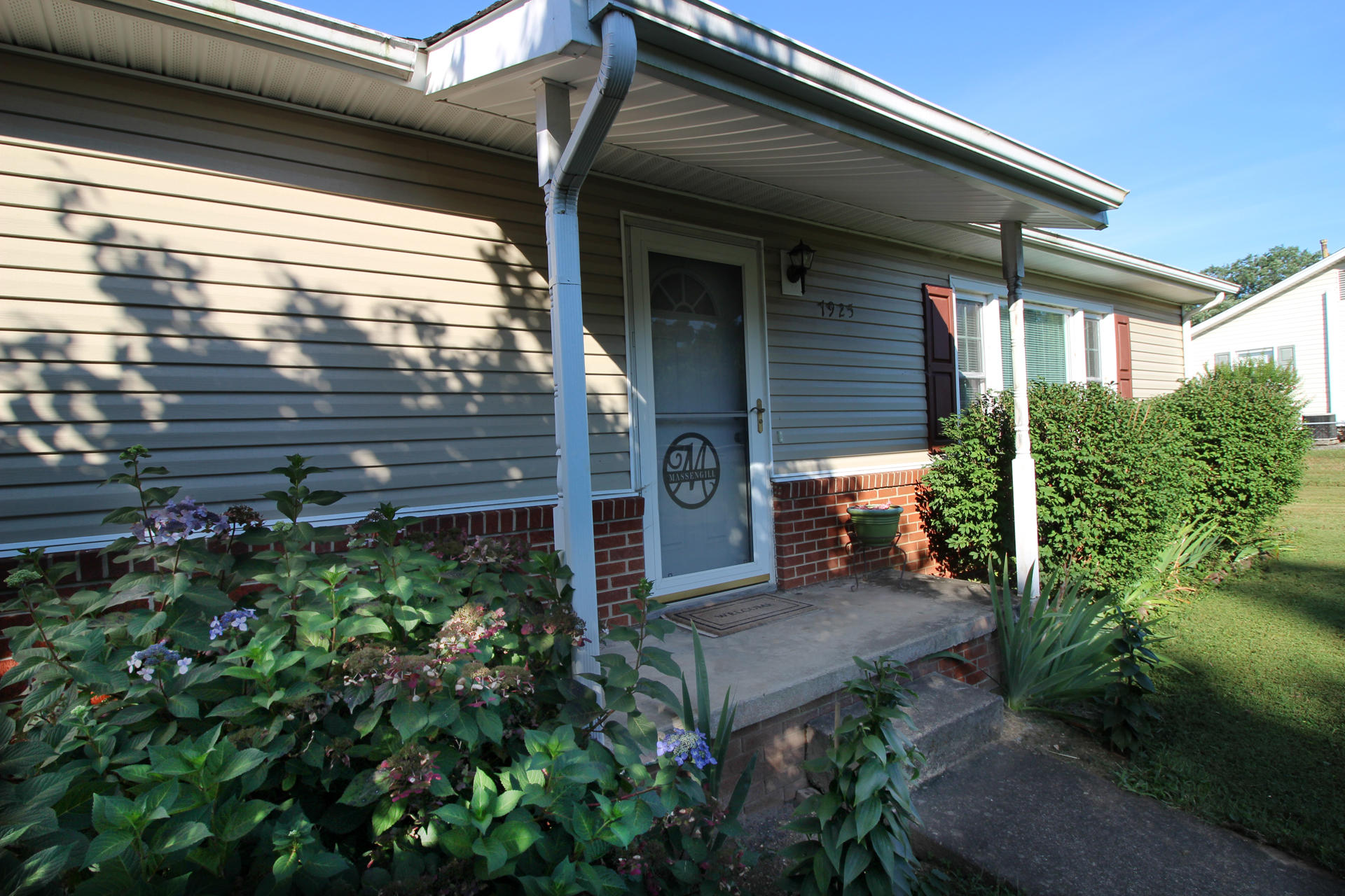7925 Sharp Road Powell, TN 37849 - Photo 6 of 14 front porch
