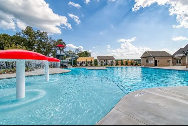 a view of a house with swimming pool