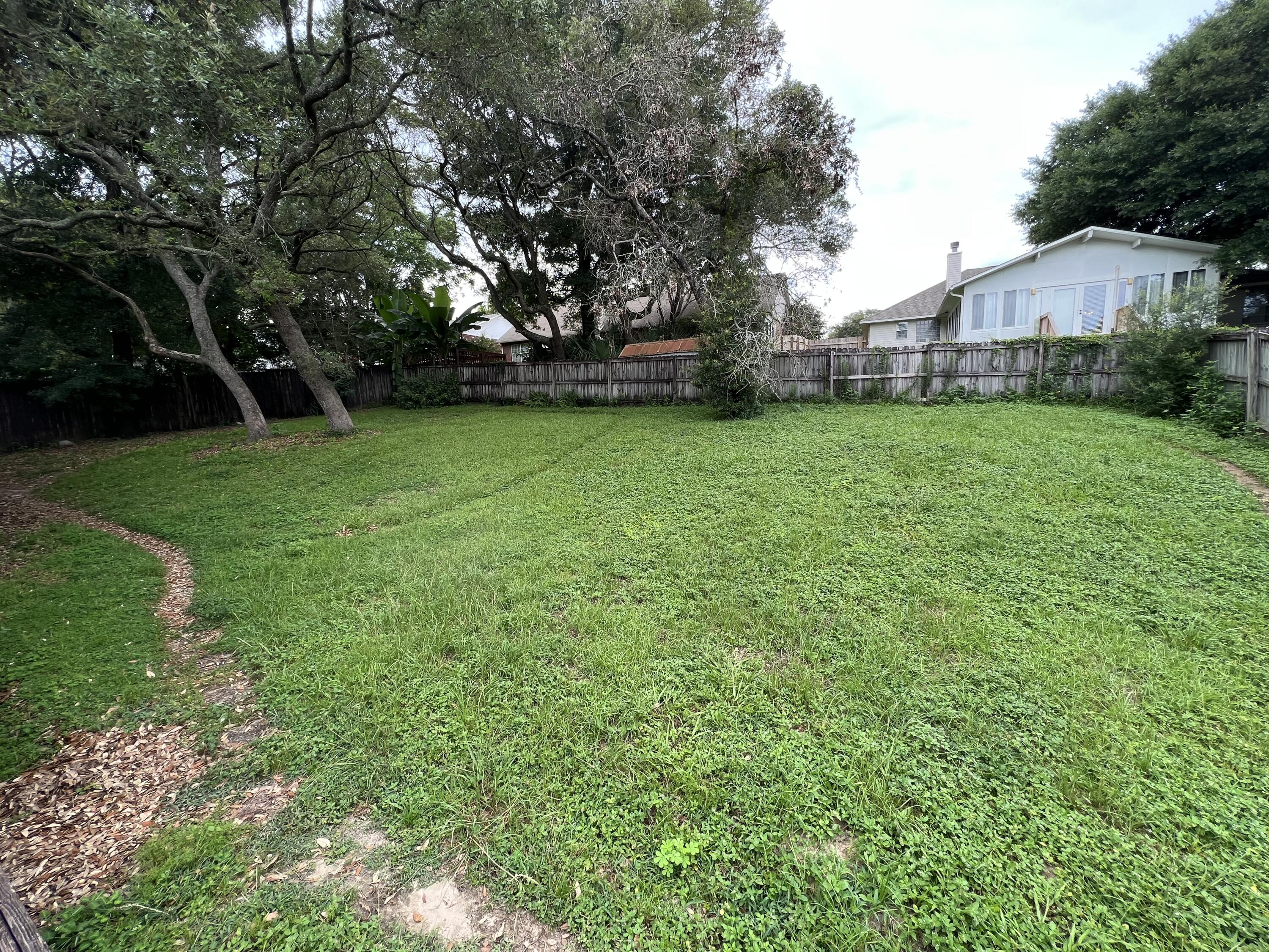 4443 Antioch Road Crestview, FL 32536 - Photo 20 of 24 a view of yard with grass and trees