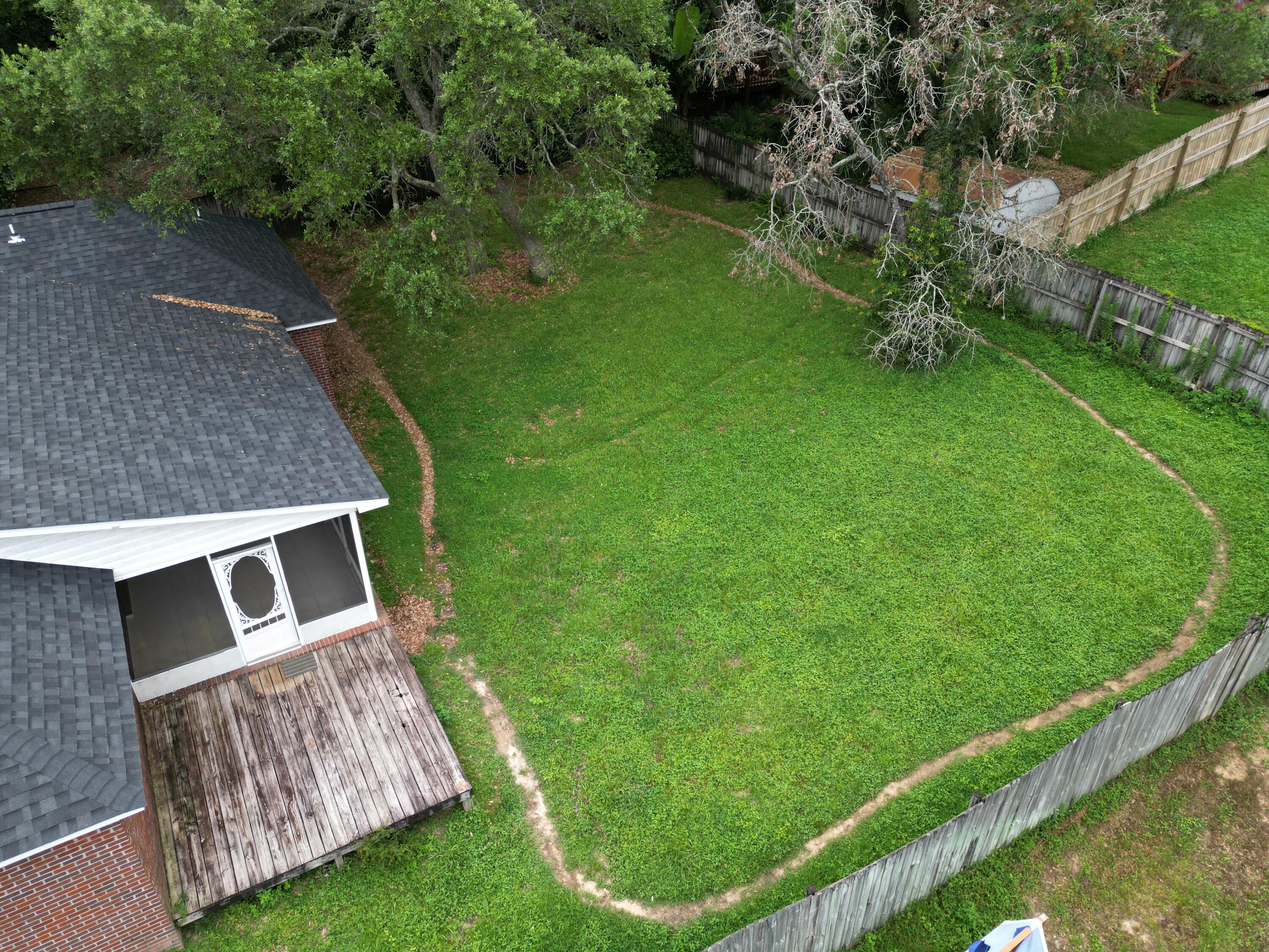 4443 Antioch Road Crestview, FL 32536 - Photo 24 of 24 a view of a backyard with plants