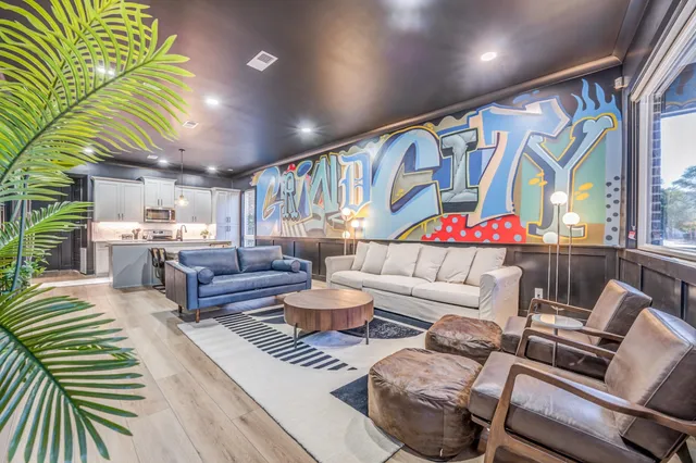 a living room with furniture and a table