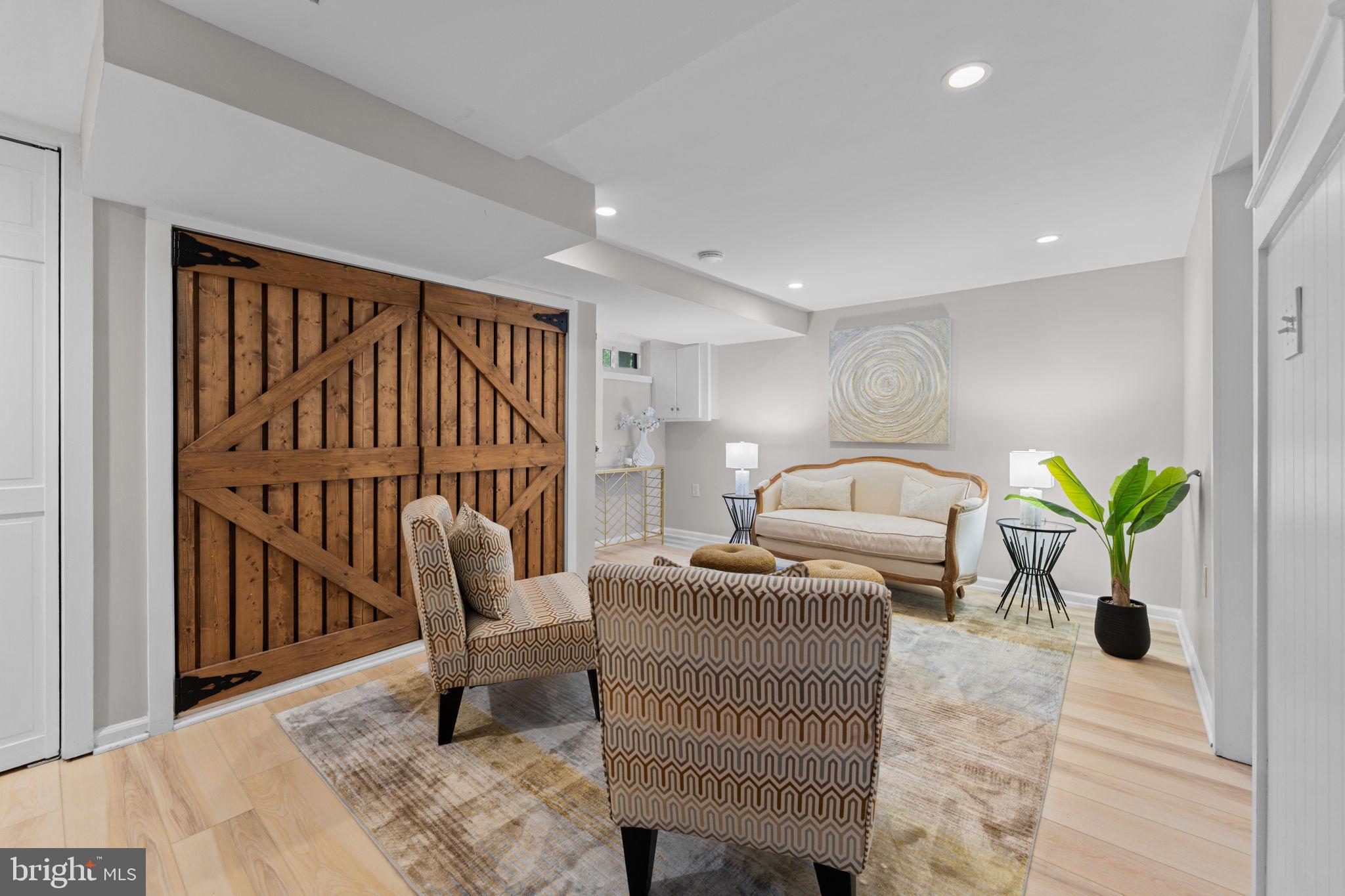 1214 West Braddock Road Alexandria, VA 22302 - Photo 25 of 39 Charming basement retreat with rustic flair.