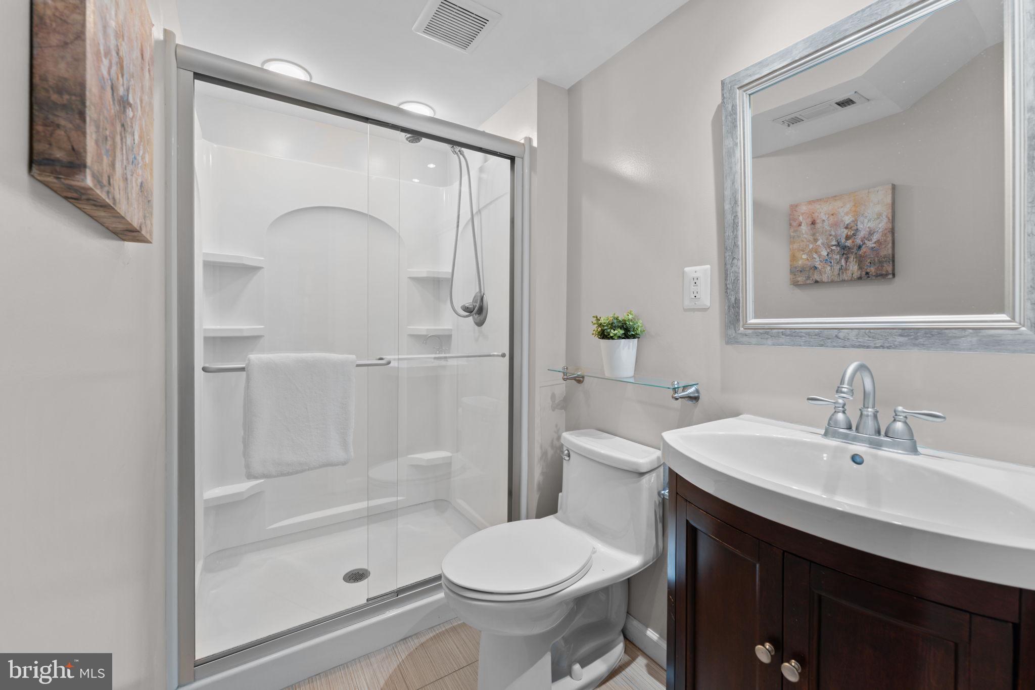 1214 West Braddock Road Alexandria, VA 22302 - Photo 28 of 39 Modern bathroom with sleek design.