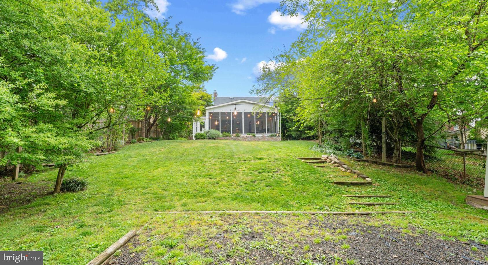 1214 West Braddock Road Alexandria, VA 22302 - Photo 35 of 39 Lush backyard oasis with serene views.