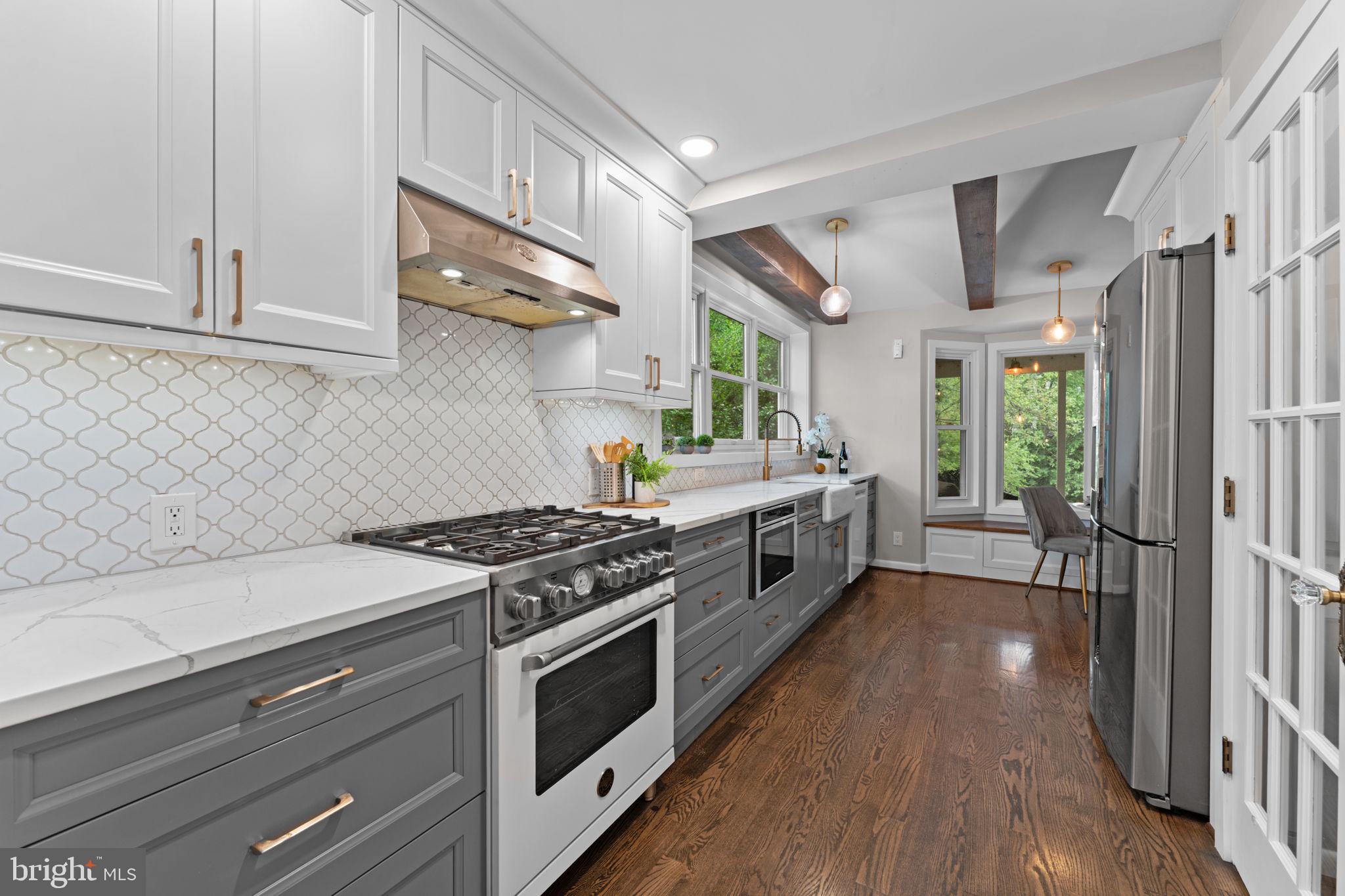 1214 West Braddock Road Alexandria, VA 22302 - Photo 9 of 39 Modern kitchen with elegant finishes.