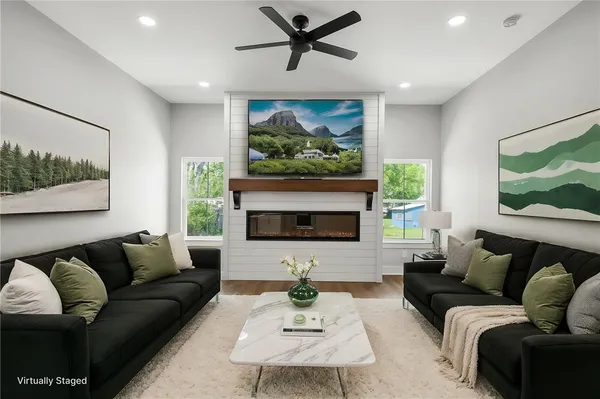 a living room with a fireplace