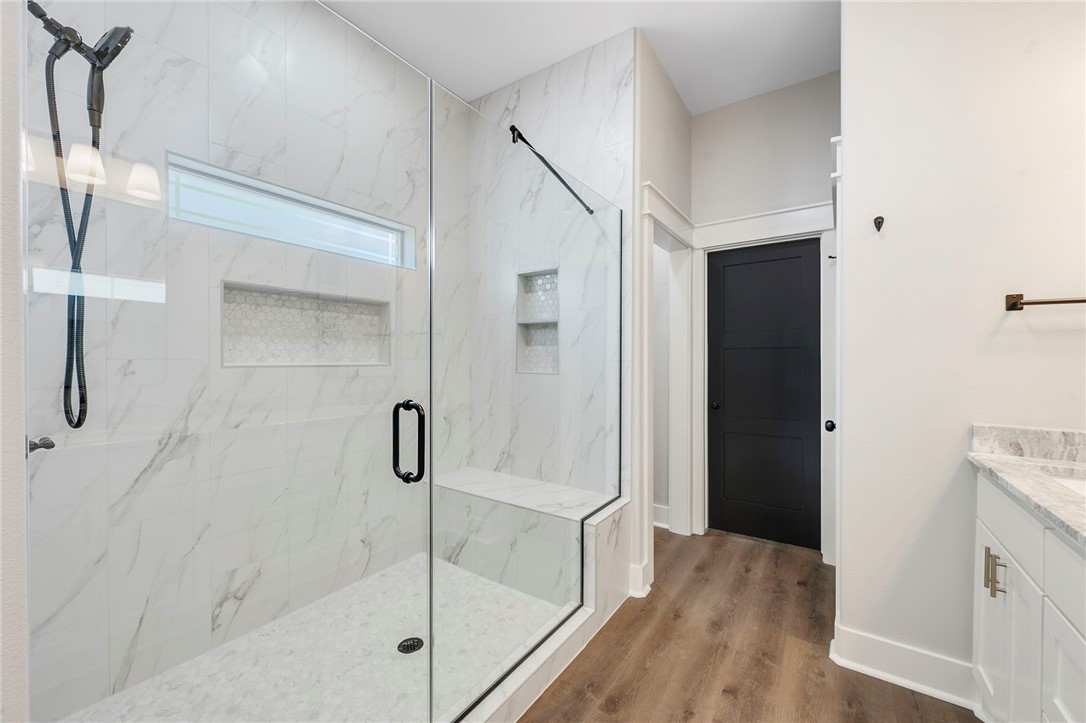 312 Morehead Street Franklin, TX 77856 - Photo 8 of 26 a bathroom with a shower