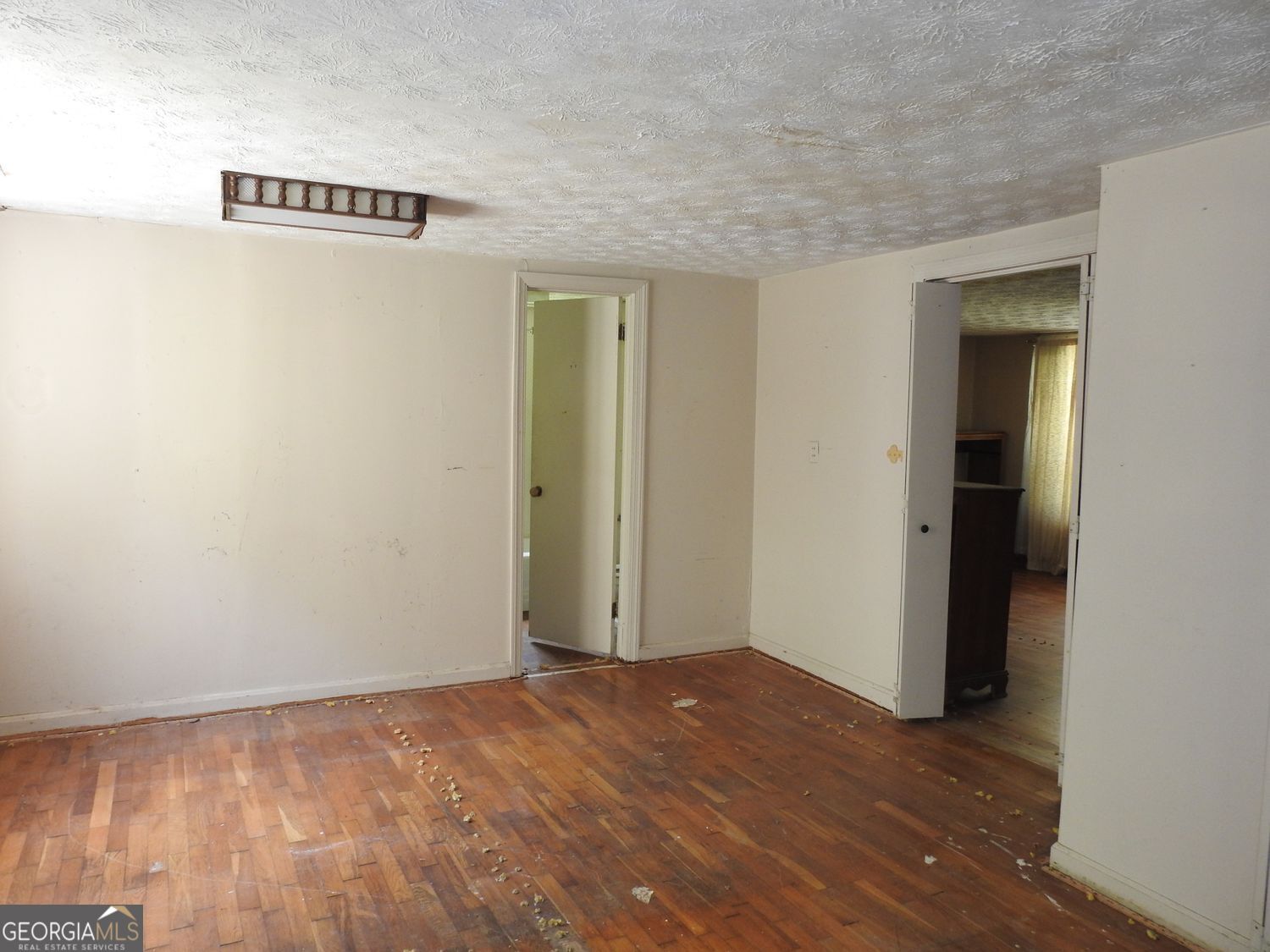 333 Lickskillet Road Epworth, GA 30541 - Photo 37 of 38 a view of a room with wooden floor