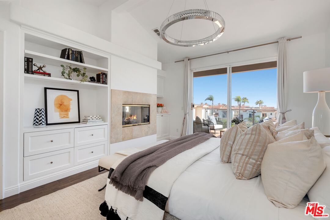 6436 Lunita Road Malibu, CA 90265 - Photo 24 of 54 a bedroom with a bed and closet