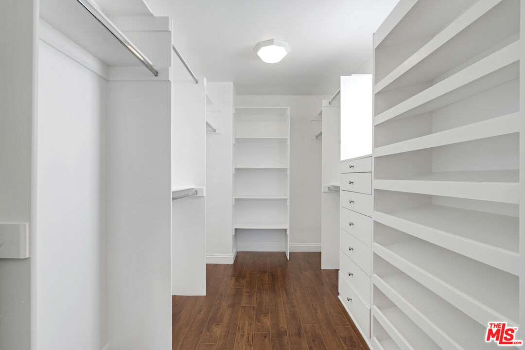 6436 Lunita Road Malibu, CA 90265 - Photo 27 of 54 a view of walk in closet with empty racks