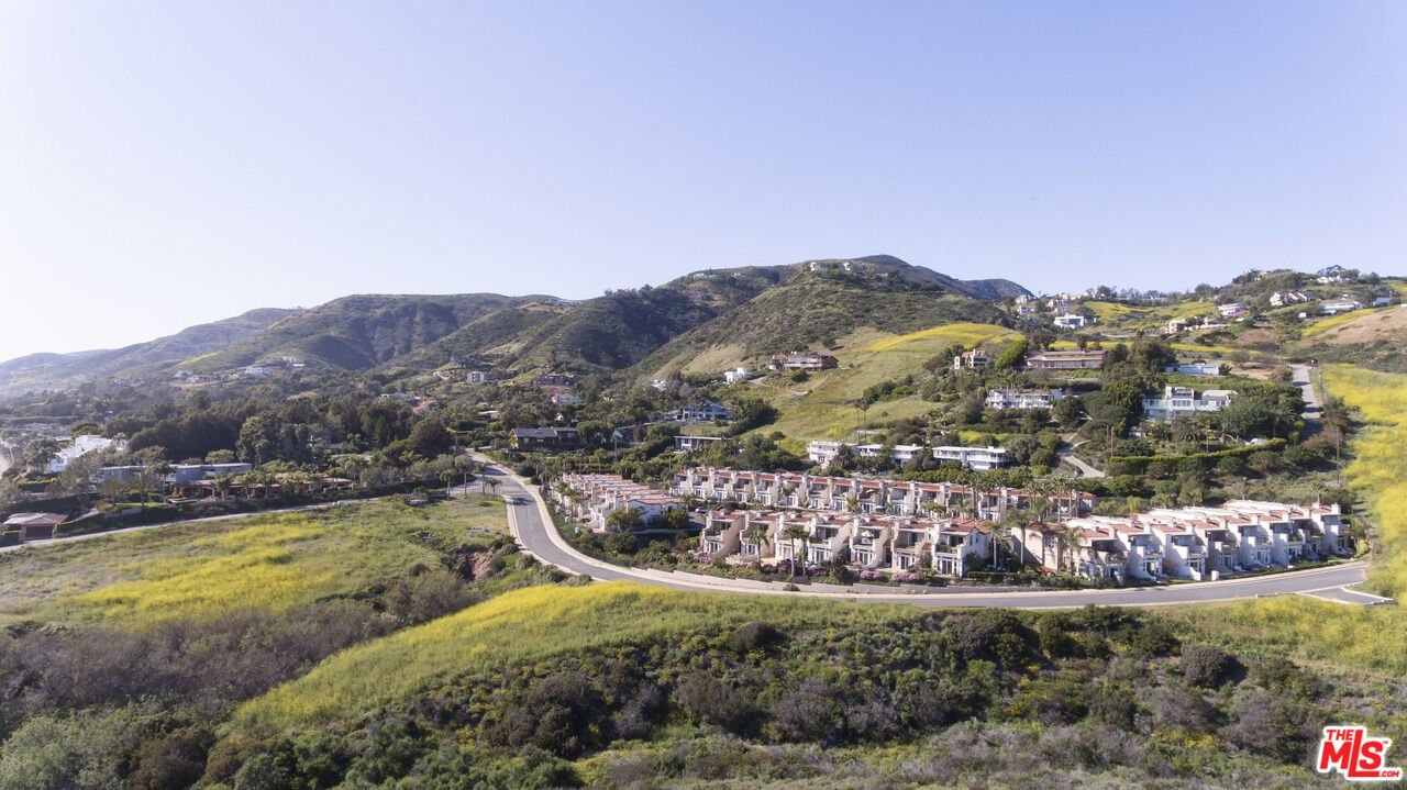 6436 Lunita Road Malibu, CA 90265 - Photo 36 of 54 a view of a city with mountains in the background