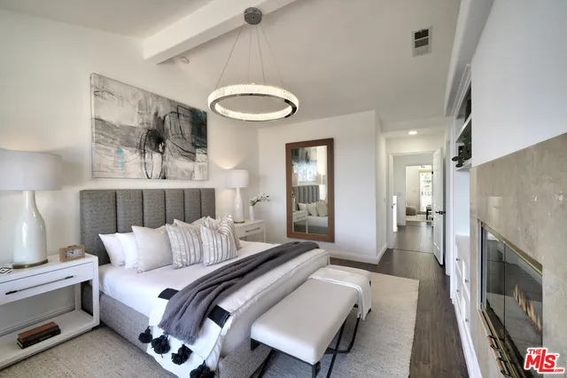 a room with a bed and a window