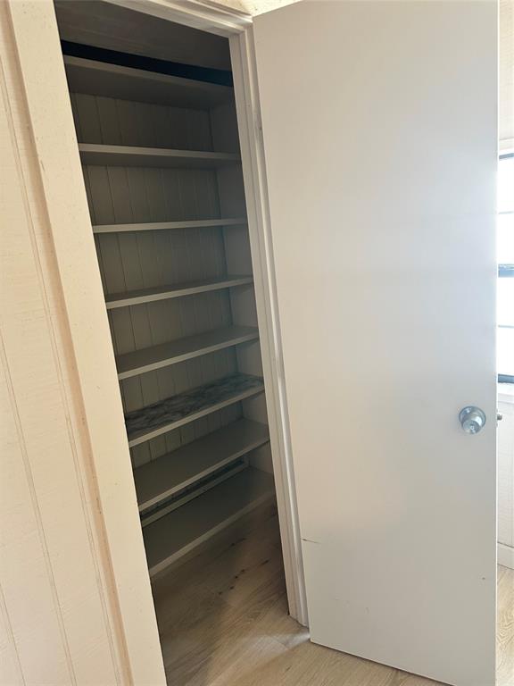 2590 Rock Ridge Road Lucas, TX 75002 - Photo 25 of 25 Built-in pantry shelving with white wood-finish materials and a patterned shelf liner