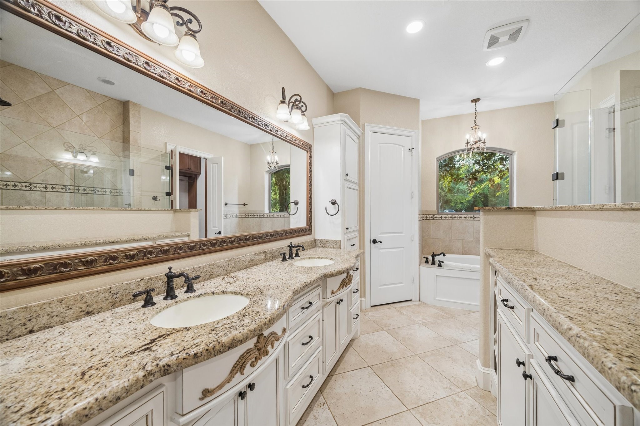28503 Champions Ridge Road Magnolia, TX 77354 - Photo 19 of 45 The primary bathroom is a spa-like oasis, offering a relaxing retreat waiting to be enjoyed.