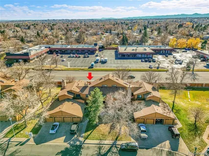 an aerial view of residential building with parking space