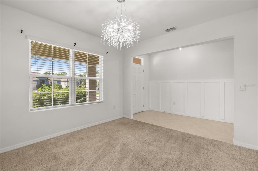 307 Sunset View Drive Edgewater, FL 32141 - Photo 11 of 44 a view of an empty room with a window