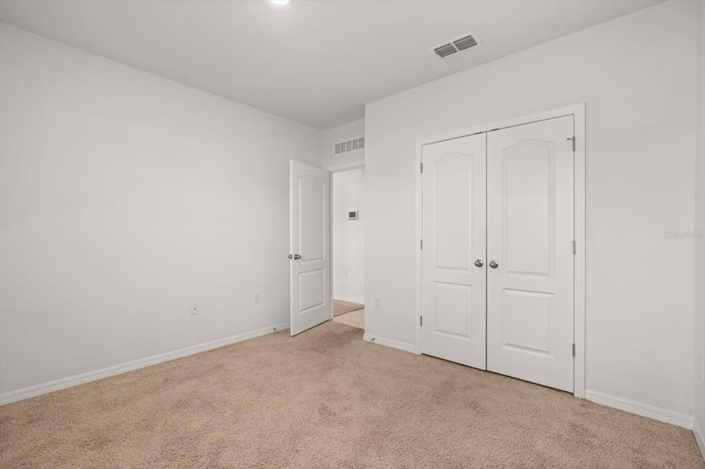 307 Sunset View Drive Edgewater, FL 32141 - Photo 16 of 44 a view of an empty room