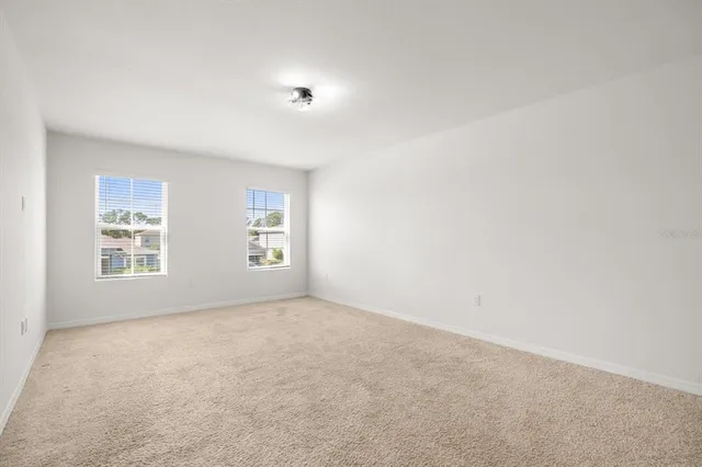 a bathroom with 2 sink and a mirror