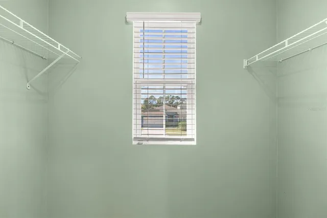 a bathroom with a shower and a tub