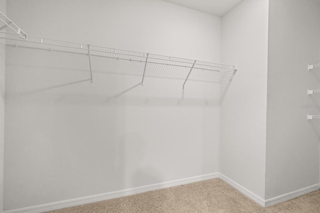 307 Sunset View Drive Edgewater, FL 32141 - Photo 22 of 44 a view of a room with racks on the wall