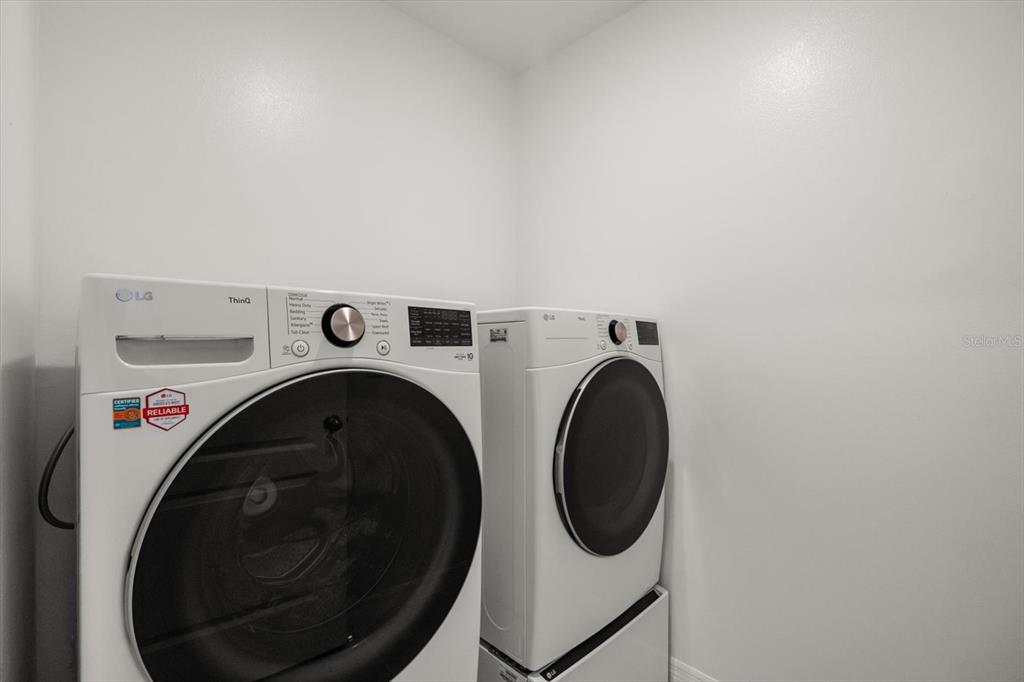 307 Sunset View Drive Edgewater, FL 32141 - Photo 23 of 44 a utility room with dryer and washer