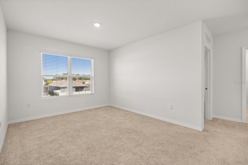 307 Sunset View Drive Edgewater, FL 32141 - Photo 26 of 44 a view of an empty room with a window