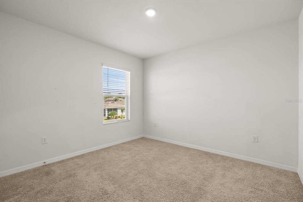 307 Sunset View Drive Edgewater, FL 32141 - Photo 28 of 44 an empty room with a window