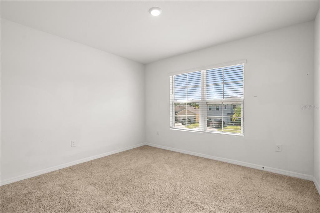 307 Sunset View Drive Edgewater, FL 32141 - Photo 32 of 44 an empty room with a window