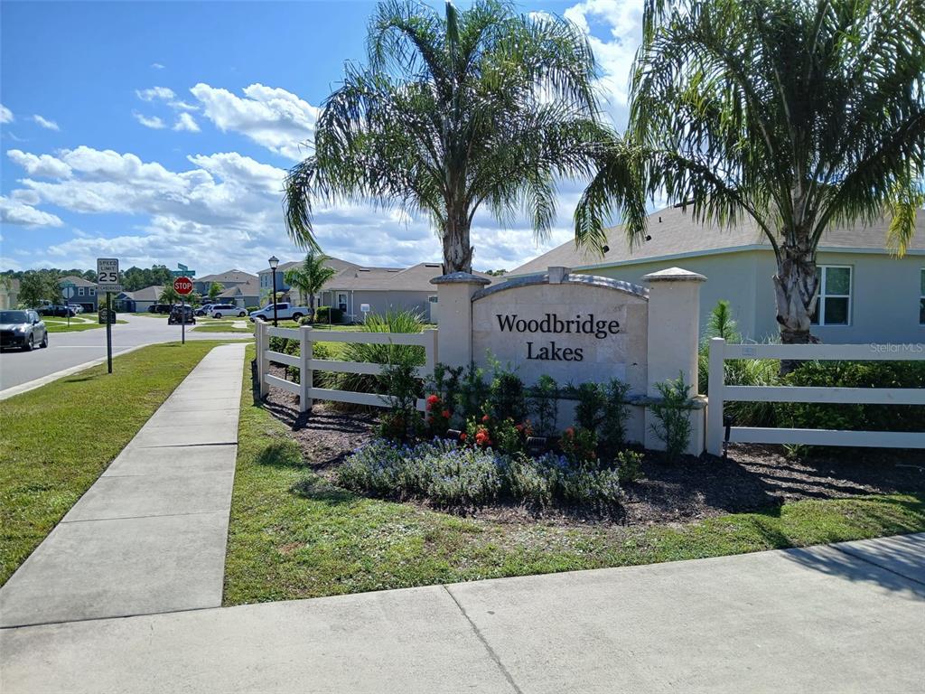 307 Sunset View Drive Edgewater, FL 32141 - Photo 43 of 44 a front view of a house with garden