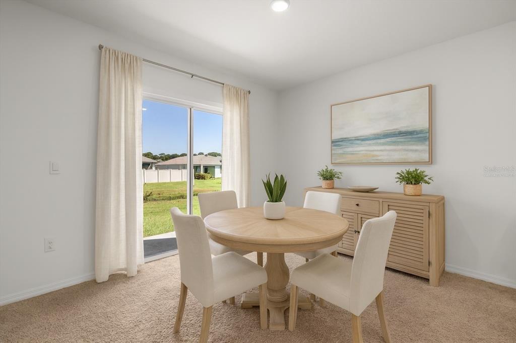 307 Sunset View Drive Edgewater, FL 32141 - Photo 6 of 44 a view of a dining room with furniture window and outside view