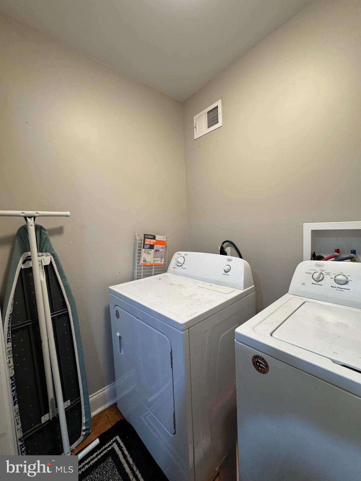 1019 West Fayette Street Baltimore, MD 21223 - Photo 17 of 29 a utility room with dryer and washer